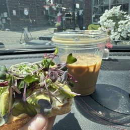 Avocado toast and iced pistachio hazelnut latte Avocado toast and iced pistachio hazelnut latte