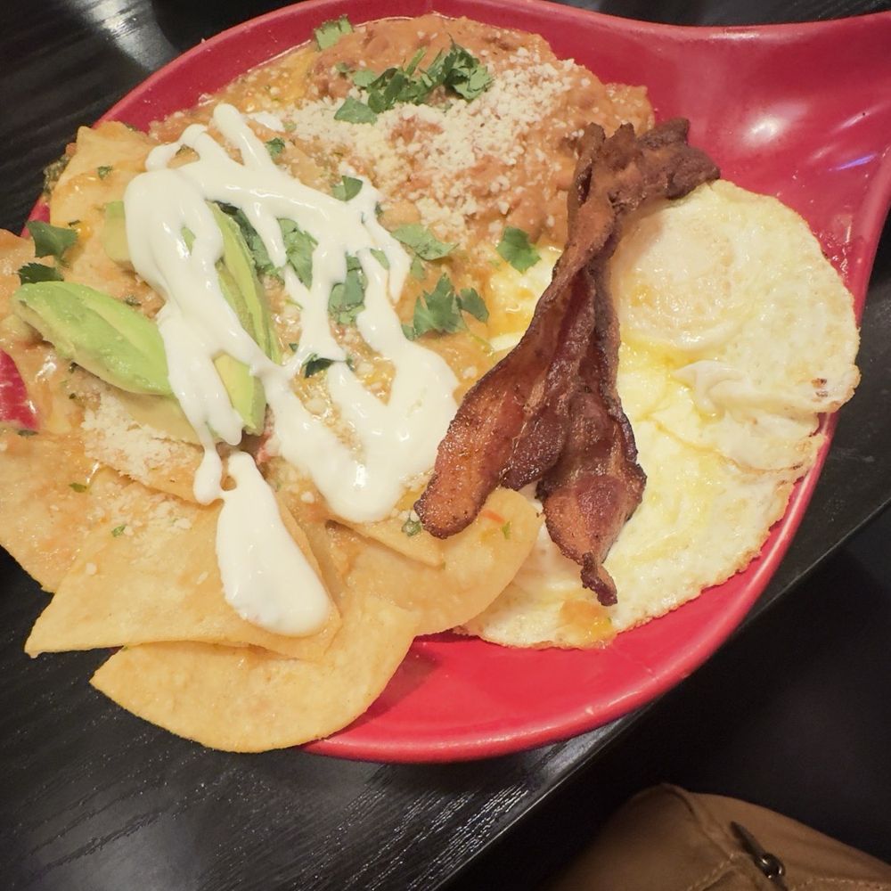 Marie Callender's - Amazing Chilaquiles with bacon and sunny side of eggs, an amazing recommendation from our server Erick. MUST TRY!! - Bakeries Near Me - Whittier, California Marie Callender's - Amazing Chilaquiles with bacon and sunny side of eggs, an amazing recommendation from our server Erick. MUST TRY!! - Bakeries Near Me - Whittier, California
