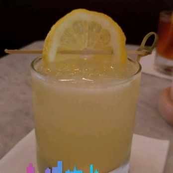 Elsa - Self-portrait,  the picture of beverage perfection - Cocktail Bars Near Me - Brooklyn, New York
