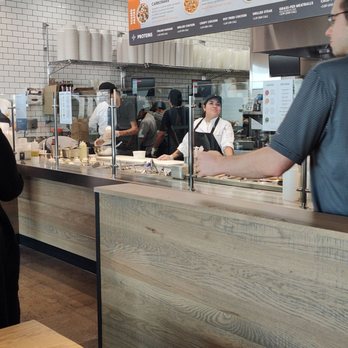 Piada Italian Street Food - customers in a restaurant - Italian Near Me - Euless, Texas Piada Italian Street Food - customers in a restaurant - Italian Near Me - Euless, Texas