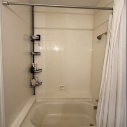 Red Stick Refinishing - Before- 1990's bathroom with cultured marble tub surround