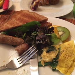 Half eaten mushroom, spinach brie cheese omelet. Very good