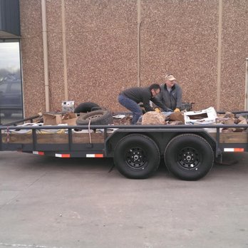 Custom Trailer Sales - New trailer loaded up with rocks and old trailer tires. - Trailer Dealers Near Me - Oklahoma City, Oklahoma Custom Trailer Sales - New trailer loaded up with rocks and old trailer tires. - Trailer Dealers Near Me - Oklahoma City, Oklahoma