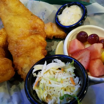 Rusty Bucket Restaurant and Tavern - Fish and chips (side of fresh fruits) - Pubs Near Me - Hilliard, Ohio Rusty Bucket Restaurant and Tavern - Fish and chips (side of fresh fruits) - Pubs Near Me - Hilliard, Ohio
