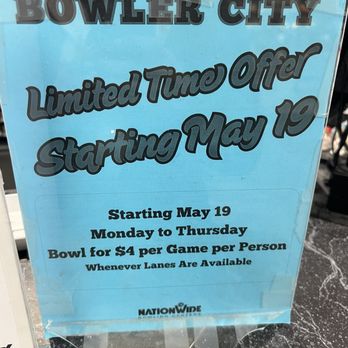 Bowler City - A blue sign at Bowler City advertising a bowling promotion starting May 19, with $4 per game from Monday to Thursday. - Bowling Near Me - Hackensack, New Jersey