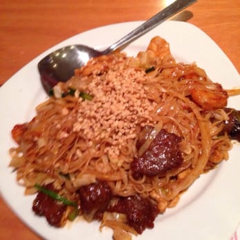 Cryster Asian Diner - a plate of noodles and meat - Diners Near Me - Topeka, Kansas