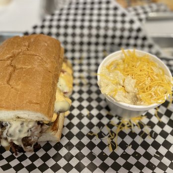 Porky's Pride Smoke House - Smoked Brisket Philly with Mac n Cheese - Food Trucks Near Me - Warrior, Alabama Porky's Pride Smoke House - Smoked Brisket Philly with Mac n Cheese - Food Trucks Near Me - Warrior, Alabama