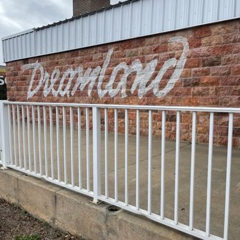 Dreamland BBQ - a painted sign on a brick wall - Barbeque Near Me - Montgomery, Alabama
