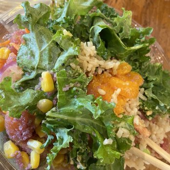 Rolltation - a salad in a plastic bowl with chopsticks - Asian Fusion Near Me - Toronto, Ontario