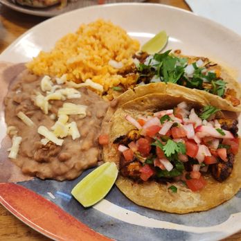 Tepalcates - Taco dinner: refried beans, rice, cauliflower taco, grilled octopus taco - Tacos Near Me - Chicago, Illinois Tepalcates - Taco dinner: refried beans, rice, cauliflower taco, grilled octopus taco - Tacos Near Me - Chicago, Illinois