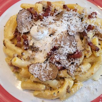 Osteria Positano - [Photos: Instagram.com/LatinAbroad] Carbonara with freshly-made rigatoni pasta, fresh warm burrata, and freshly-shaved TRUFFLES - Italian Near Me - Miami Beach, Florida