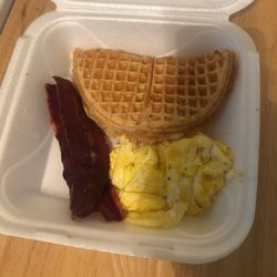 Ari’s Ice Cream Parlor and Café - Waffle plate, turkey bacon, we'll-seasoned scrambled eggs.