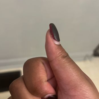 Saradet Nails And Spa - The nail polish previously put on showing through the top coat - Nail Salons Near Me - Rockville, Maryland Saradet Nails And Spa - The nail polish previously put on showing through the top coat - Nail Salons Near Me - Rockville, Maryland