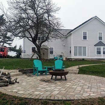 Green Team Contracting - Paver Patio with Firepit - Landscaping Near Me - Lunenburg, Nova Scotia Green Team Contracting - Paver Patio with Firepit - Landscaping Near Me - Lunenburg, Nova Scotia