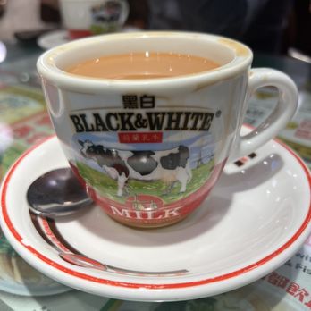 康年餐廳 - Hot Hong Kong Milk Tea. Add sugar to enhance the flavor. - Hong Kong Style Cafe Near Me - Hong Kong, HK 康年餐廳 - Hot Hong Kong Milk Tea. Add sugar to enhance the flavor. - Hong Kong Style Cafe Near Me - Hong Kong, HK