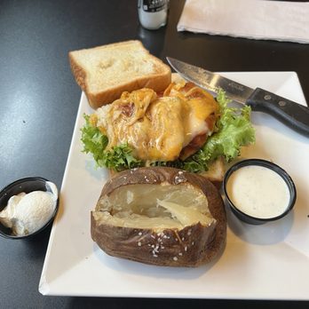 Social House 103 - Chicken Sandwich with Ranch Dressing and Baked Potato - Bars Near Me - Dundee, Michigan Social House 103 - Chicken Sandwich with Ranch Dressing and Baked Potato - Bars Near Me - Dundee, Michigan
