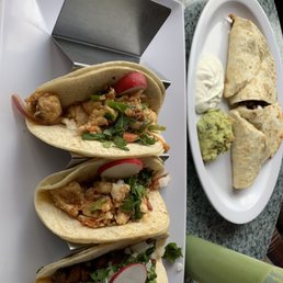 Taco al pastor, fish tilapia tacos and beef quesadilla