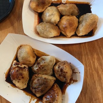 Marco & Luca - Pork, Leek, and Ginger Fried Dumplings with Marco Luca Soy Sauce and Hot Sauce - Chinese Near Me - Charlottesville, Virginia