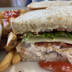 Early Edition - Turkey club, french fries, salad with their trademark honey mustard dressing.