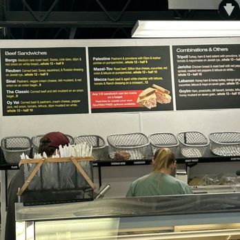 L'Chayim Delicatessen - a woman working behind a counter - Bagels Near Me - Beulah, Michigan L'Chayim Delicatessen - a woman working behind a counter - Bagels Near Me - Beulah, Michigan