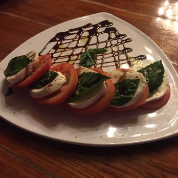 The District Tap - Caprese salad - Sports Bars Near Me - Indianapolis, Indiana The District Tap - Caprese salad - Sports Bars Near Me - Indianapolis, Indiana