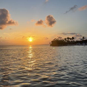 Cruisin’ Tikis Key Largo -  the sun setting over the water - Tiki Bars Near Me - Key Largo, Florida