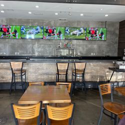 Fire Wings - Beer taps and football.