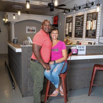Frios Gourmet Pops - Newnan - a man and woman sitting on stools in a restaurant - Ice Cream & Frozen Yogurt Near Me - Newnan, Georgia Frios Gourmet Pops - Newnan - a man and woman sitting on stools in a restaurant - Ice Cream & Frozen Yogurt Near Me - Newnan, Georgia