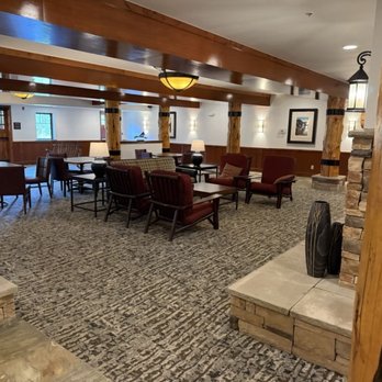 WorldMark West Yellowstone - A nice open space and fireplace behind the lobby. Towards the left you can see the doorway to head to the pool - Hotels Near Me - West Yellowstone, Montana WorldMark West Yellowstone - A nice open space and fireplace behind the lobby. Towards the left you can see the doorway to head to the pool - Hotels Near Me - West Yellowstone, Montana