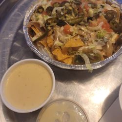 Lilia's Taqueria - This is vegi nachos & a side order of white cheese sauce.