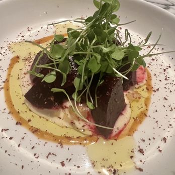 The Cooks' House - Beet salad selection. Shaved chocolate and water cress with the olive oil and gourmet sauce combination was amazing! - New American Near Me - Traverse City, Michigan