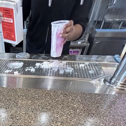 The cold foam dripping down the cup she later handed me.