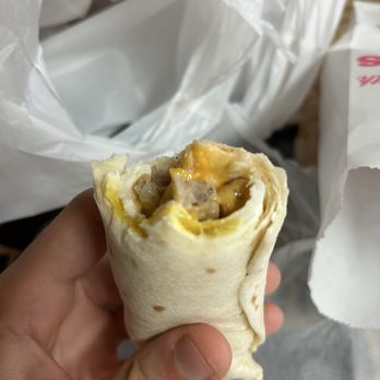 The Doughnut Cafe & Coffeehouse - Sausage, egg, and cheese burrito - Donuts Near Me - Texarkana, Texas The Doughnut Cafe & Coffeehouse - Sausage, egg, and cheese burrito - Donuts Near Me - Texarkana, Texas