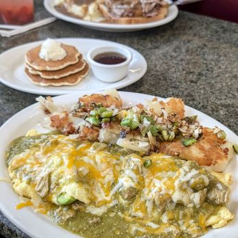 Amy's Cafe - Chile Verde omelette with home fries & dollar pancakes. I added bell peppers & onions - Diners Near Me - Riverside, California