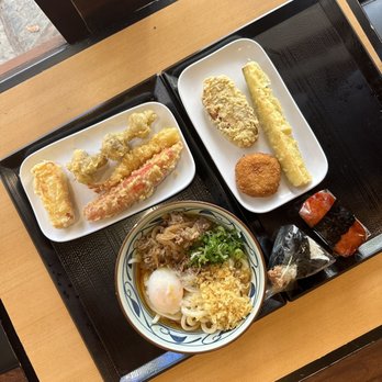 Marugame Udon - Nikutama udon, almost all of the tempura, and Spam Musubi and Salmon Musubi - Japanese Near Me - Honolulu, Hawaii Marugame Udon - Nikutama udon, almost all of the tempura, and Spam Musubi and Salmon Musubi - Japanese Near Me - Honolulu, Hawaii