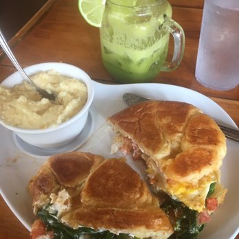 Two Chicks Cafe - Fried eggwich without the mushrooms, side of grits, & green blast juice. All delicious & fresh!! Great quality too! - Breakfast & Brunch Near Me - New Orleans, Louisiana Two Chicks Cafe - Fried eggwich without the mushrooms, side of grits, & green blast juice. All delicious & fresh!! Great quality too! - Breakfast & Brunch Near Me - New Orleans, Louisiana