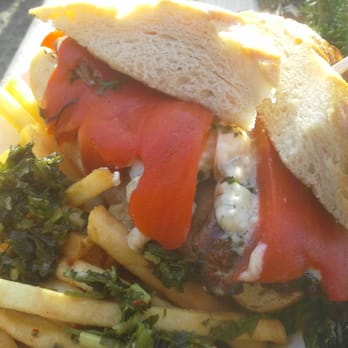 Piaggio Gaucho On Wheels - Porker Sandwich - Marinated & Grilled Pork Collar Loin, Bleu Cheese, Roasted Red Peppers, and Chimichurri Sauce on French Bread - Argentine Near Me