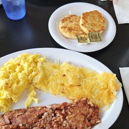 Corn beef hash, eggs, biscuit, and hash brown. Corn beef hash, eggs, biscuit, and hash brown.