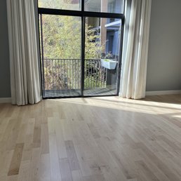 Living area, new flooring, natural maple