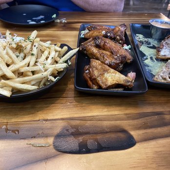 Novellus - Wings with brown sugar bourbon sauce and steak rolls - New American Near Me - Saint Charles, Missouri