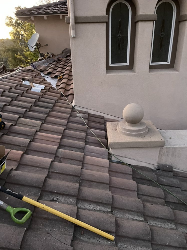 Slide of Juan's Pro Roofers