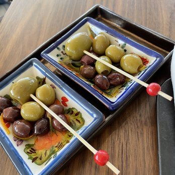 MDRD - Complimentary olives - nice citrus zest and rosemary accents. - Spanish Near Me - Grand Rapids, Michigan MDRD - Complimentary olives - nice citrus zest and rosemary accents. - Spanish Near Me - Grand Rapids, Michigan