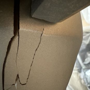Ontrack Moving & Storage - The side view of the cracked buffet leg. - Movers Near Me - Peoria, Arizona