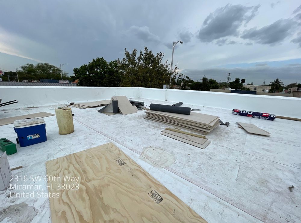 Slide of Mighty Dog Roofing Broward