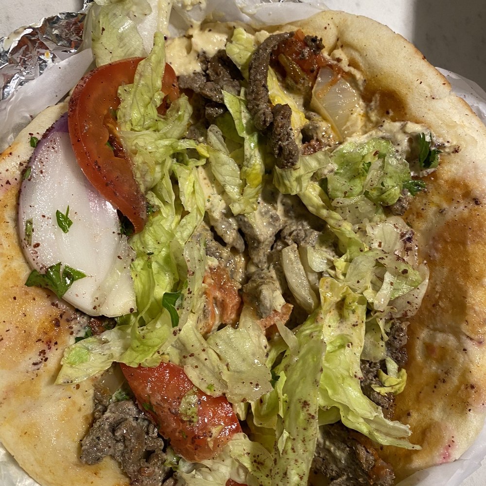 Aladdin Falafel Corner - Gyro Lamb & Beef Sandwich isn't packed to the brim like some other local places. - Mediterranean Near Me - Seattle, Washington Aladdin Falafel Corner - Gyro Lamb & Beef Sandwich isn't packed to the brim like some other local places. - Mediterranean Near Me - Seattle, Washington