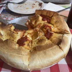 Luigis Pasta & Pizza - Small stuffed with Pepperoni and Sausage