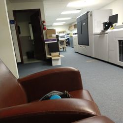 American Printing and Publishing - Front waiting area has a pretty comfy chair.