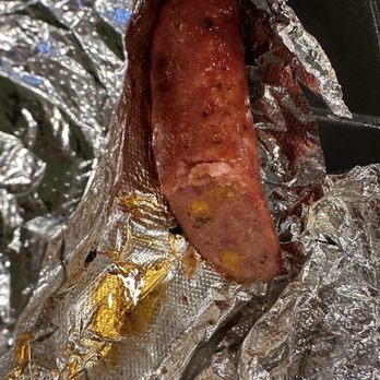 Four 41 South BBQ - Sausage with orange specs of pimento cheese - Barbeque Near Me - Canton, Georgia