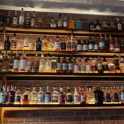 Taps and Hops Eatery - Wall of whiskey