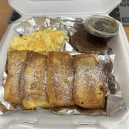 French Toast and scrambled eggs with cheese and sausage patties French Toast and scrambled eggs with cheese and sausage patties